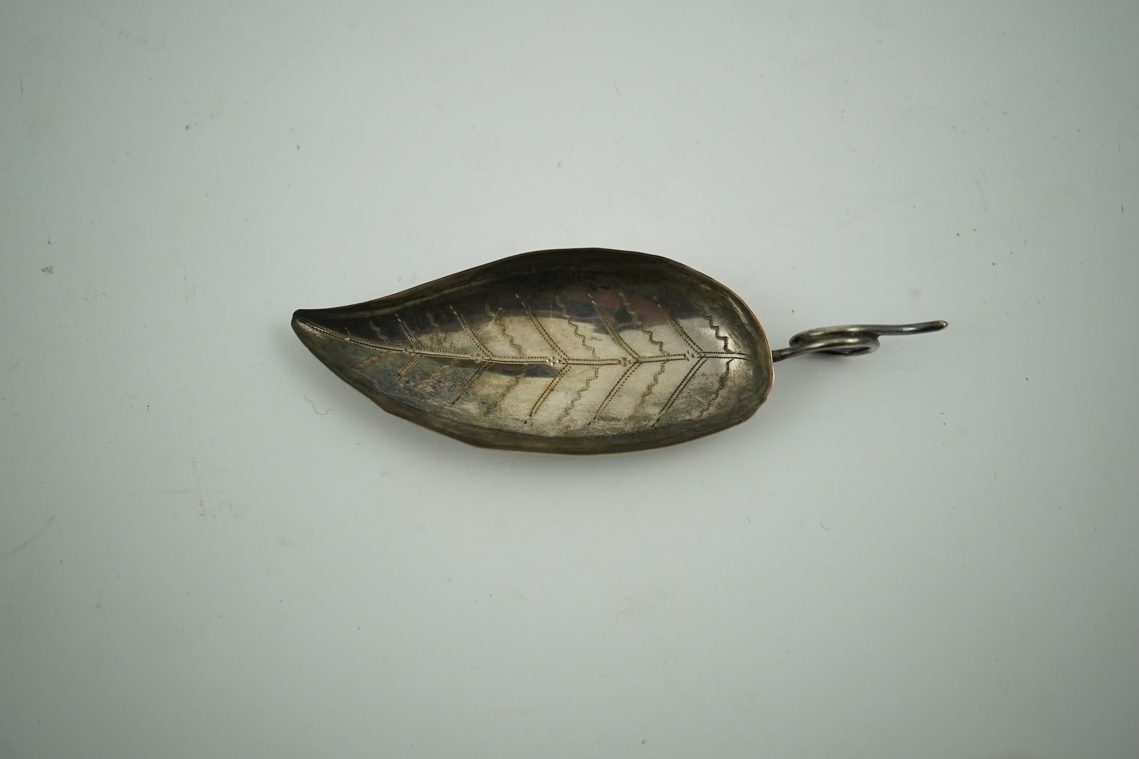 A George IV silver leaf shaped caddy spoon, maker I.T. Birmingham, 1823, 81mm. Condition - fair